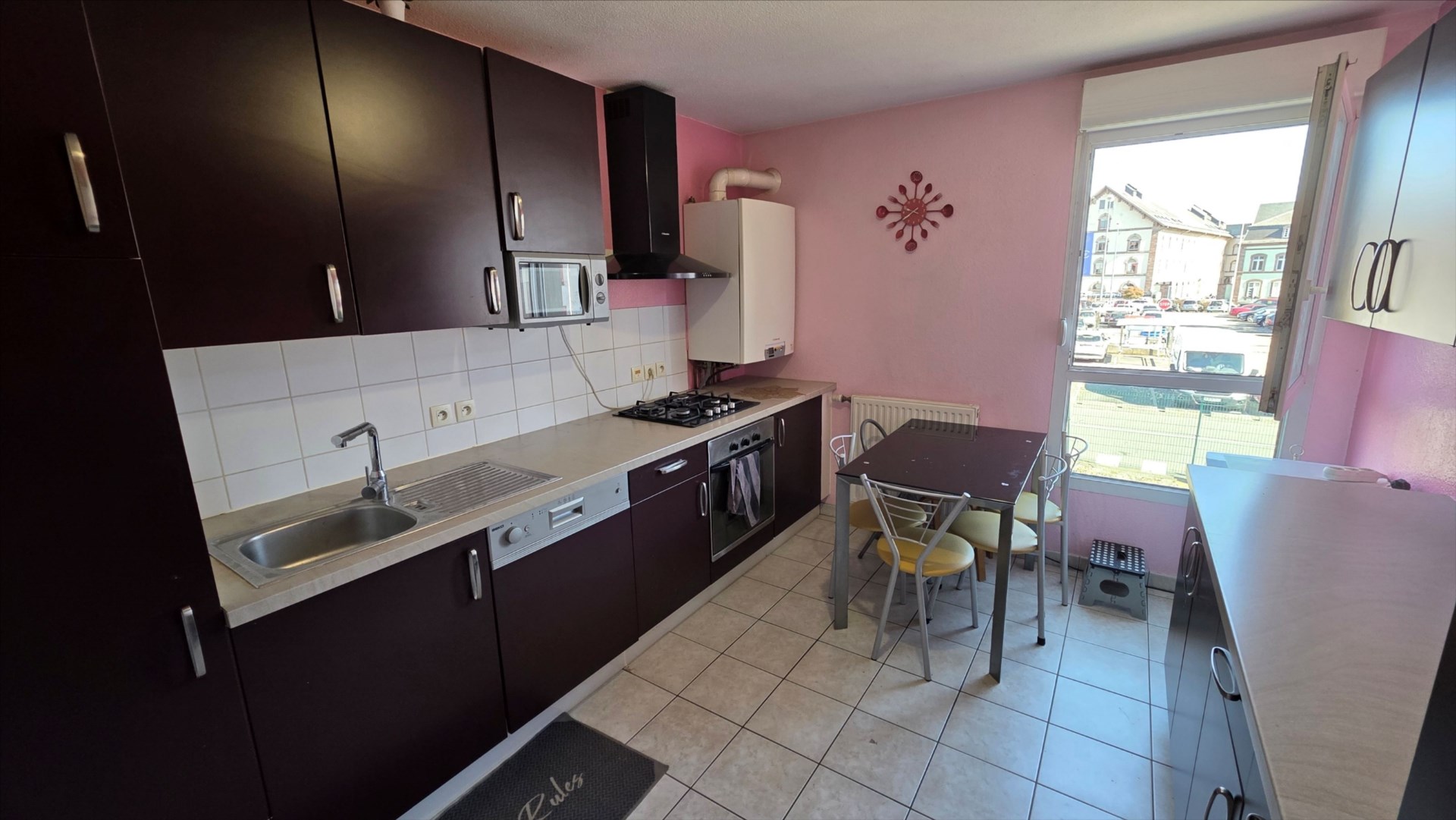 T4 D’ANGLE AVEC TERRASSES ET BOX